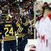 The Michigan team celebrates scoring in the second period of the game against Miami on Saturday, March 23. Daniel Brenner I AnnArbor.com